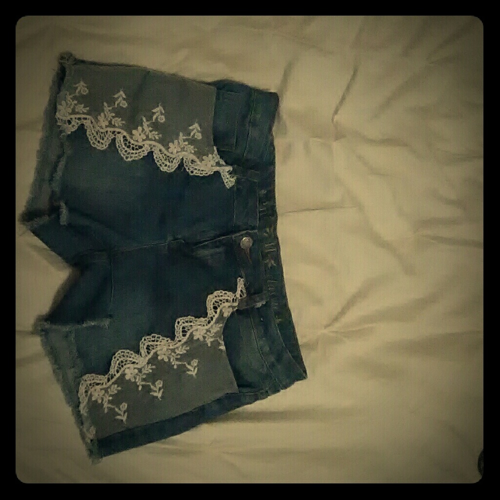 Side laced blue jean shorts